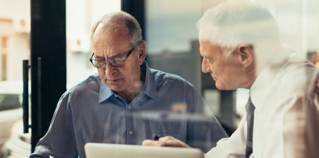 Senior citizen reviewing documents